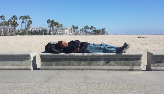 Man sleeping by L.A. beach