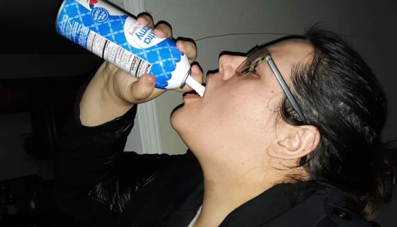 Swallowing whipped cream out of can